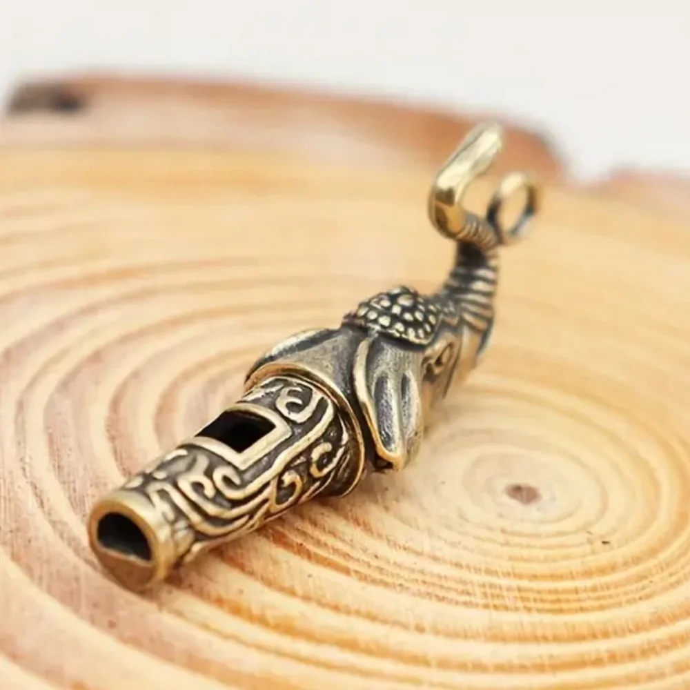 Vintage brass elephant whistle pendant